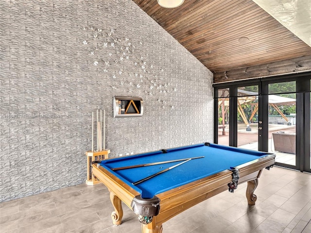 playroom featuring french doors, vaulted ceiling, and wooden ceiling