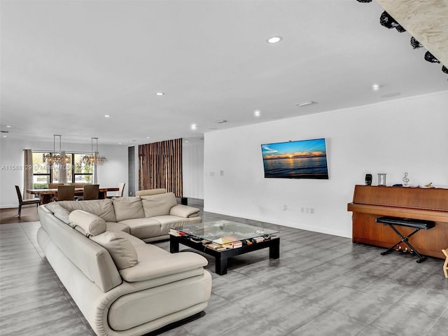 living area with baseboards and recessed lighting