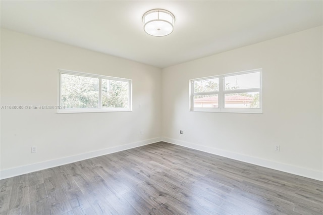 empty room featuring hardwood / wood-style floors