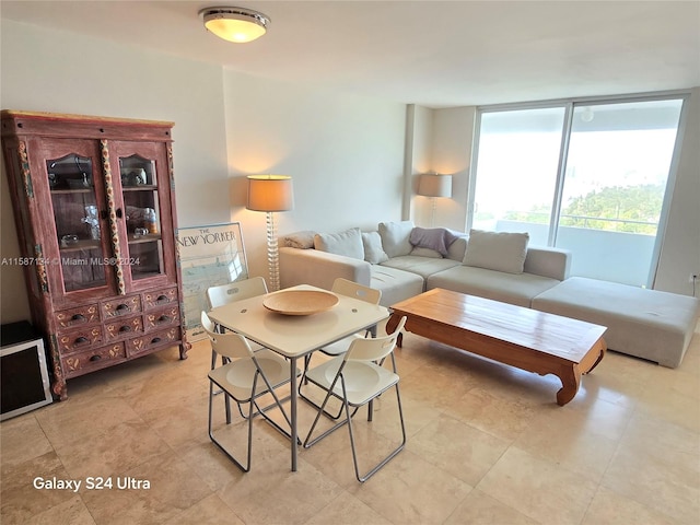 living room featuring light tile floors