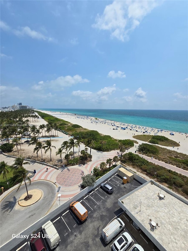 drone / aerial view with a view of the beach and a water view