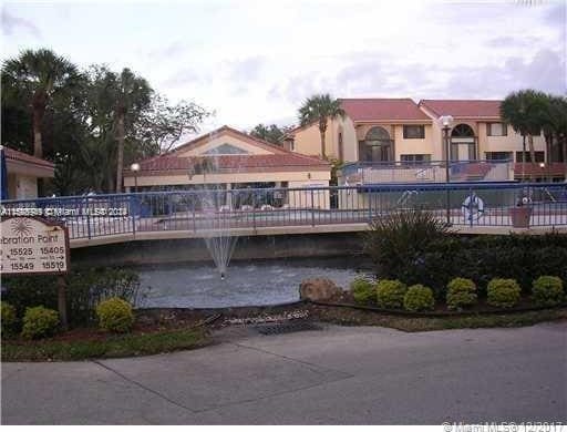 surrounding community featuring a pool