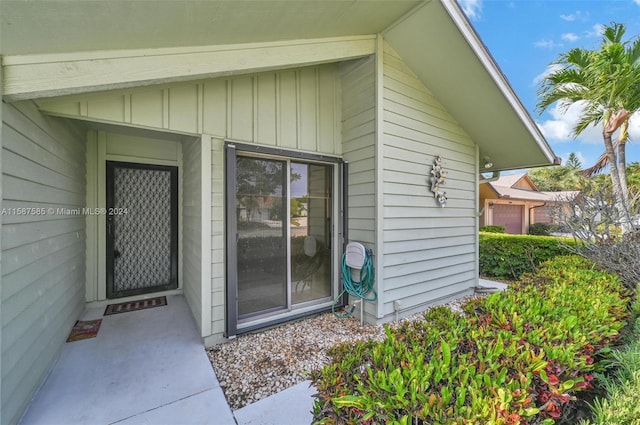 property entrance featuring a garage