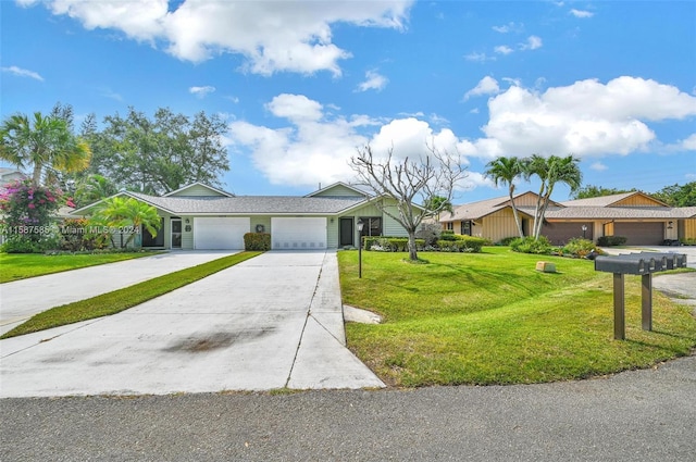 ranch-style house with a front yard and a garage