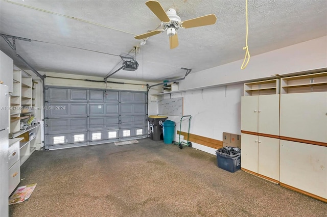 garage featuring a garage door opener and ceiling fan