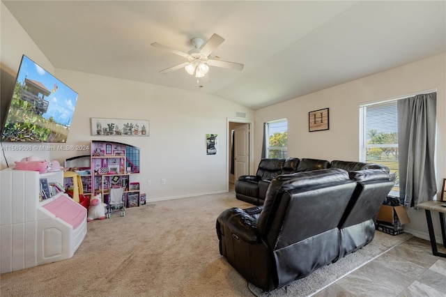 living room with light carpet, ceiling fan, and lofted ceiling