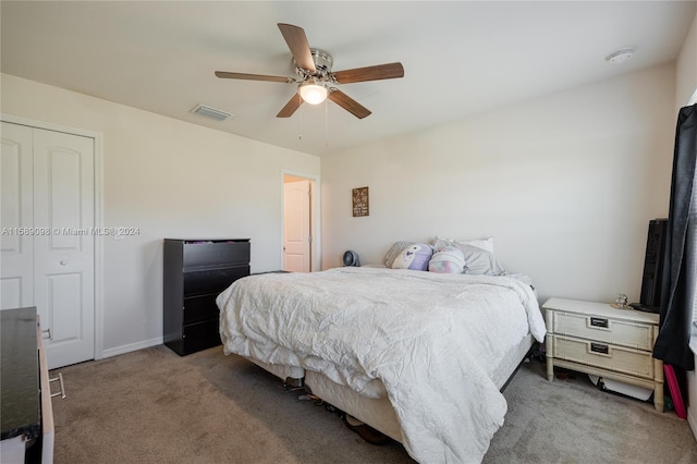 bedroom featuring carpet, a closet, and ceiling fan