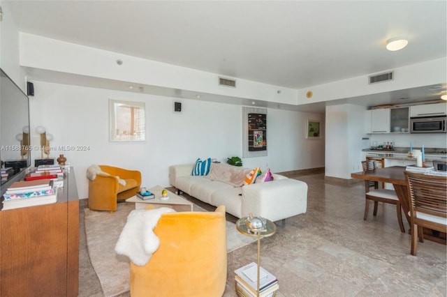 living room featuring tile floors