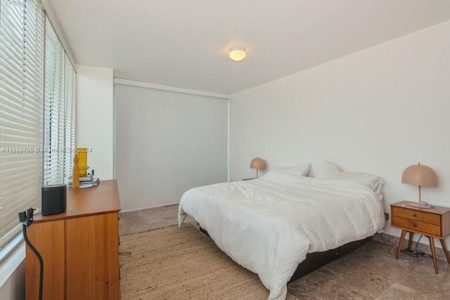 bedroom featuring tile floors