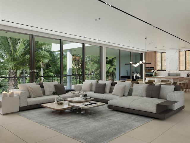 tiled living room featuring an inviting chandelier and floor to ceiling windows