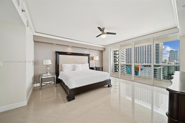 tiled bedroom featuring access to outside and ceiling fan