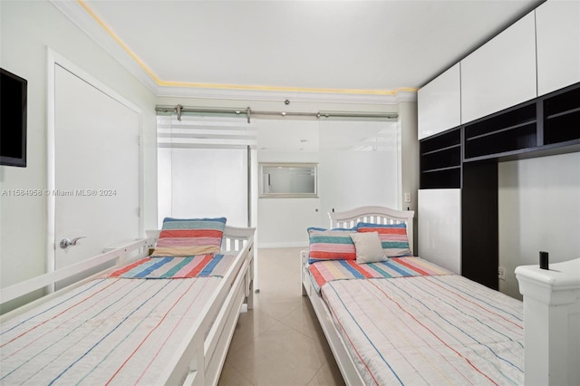 bedroom with ornamental molding and light tile floors