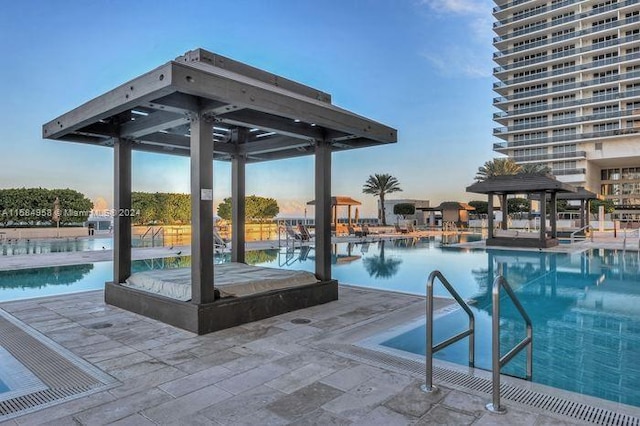 view of swimming pool with a gazebo