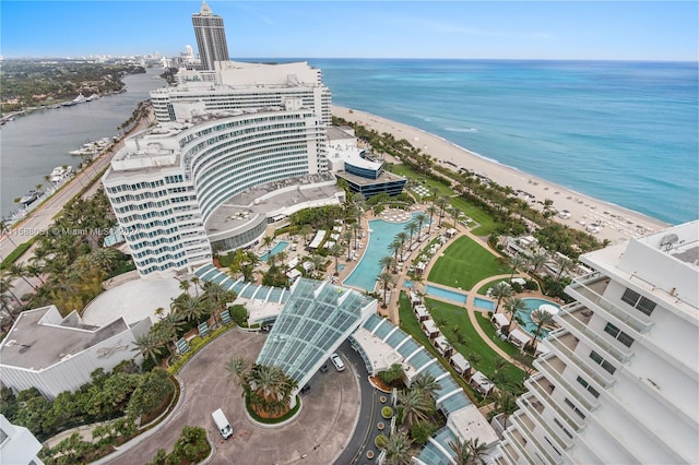 bird's eye view with a beach view and a water view