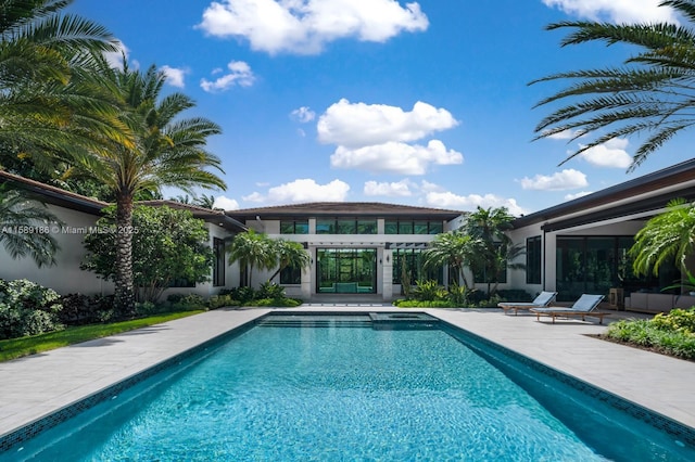 view of pool featuring a patio area