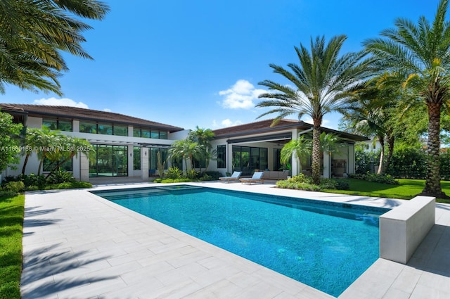 view of pool featuring a patio