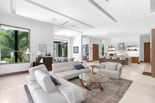 living room featuring plenty of natural light