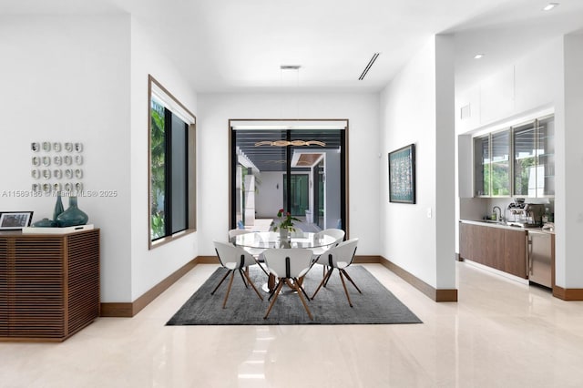 dining area featuring ceiling fan