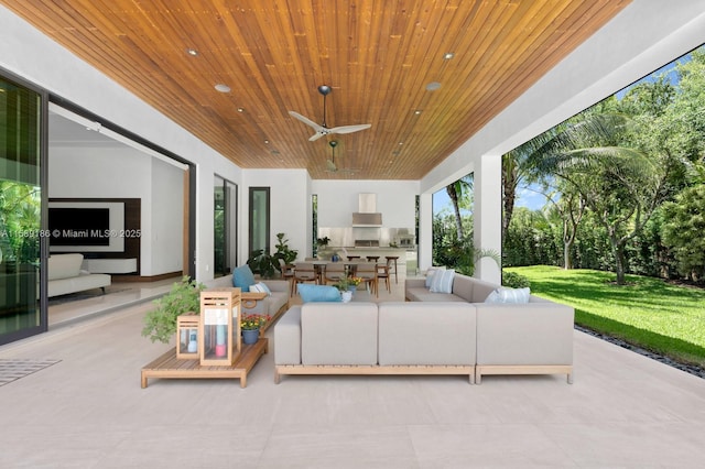 view of patio featuring ceiling fan and an outdoor hangout area