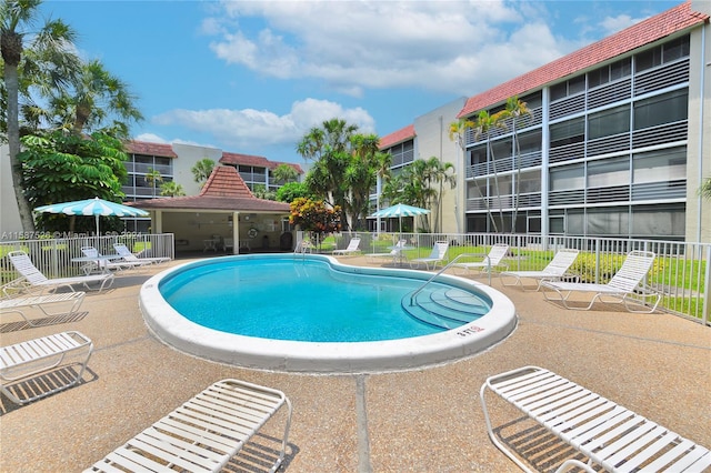 view of swimming pool featuring a patio