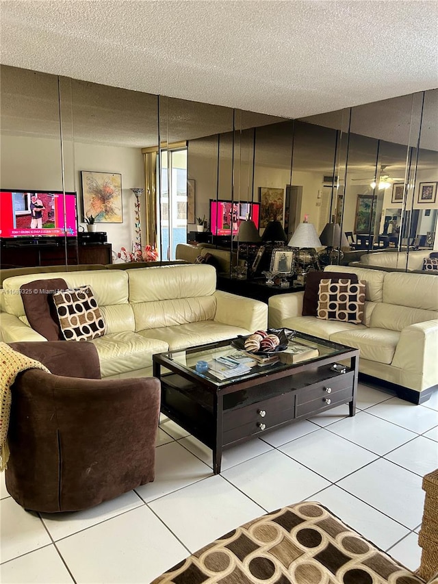 tiled living room with a textured ceiling