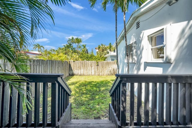 view of yard featuring a wooden deck