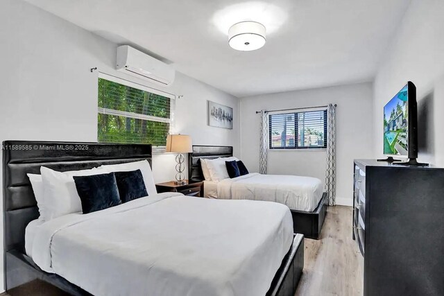 bedroom featuring hardwood / wood-style floors