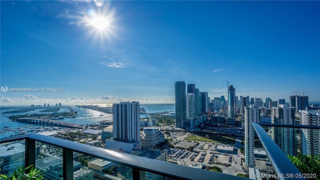 property's view of city with a water view