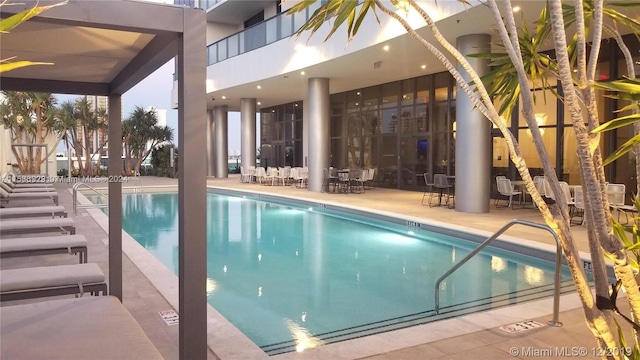 view of pool featuring a patio