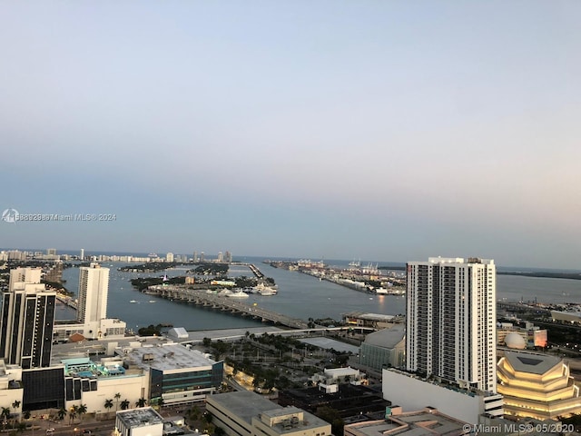 property's view of city featuring a water view