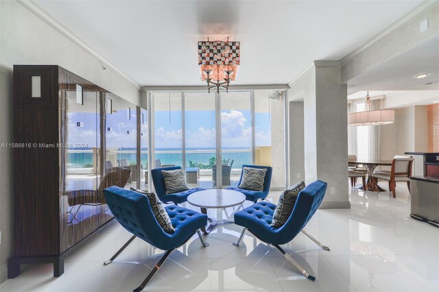 interior space featuring a water view, floor to ceiling windows, ornamental molding, and light tile patterned floors