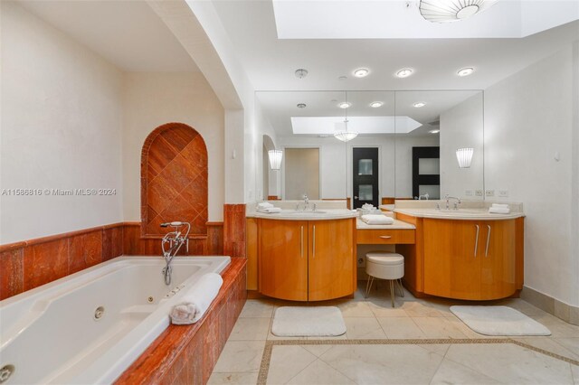 bathroom with tile patterned flooring and double sink vanity