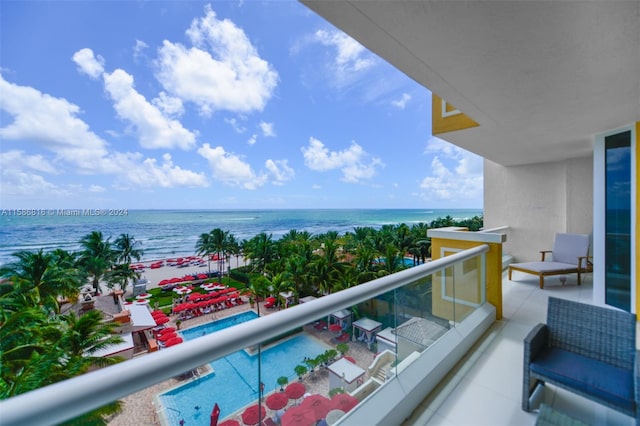 balcony featuring a water view