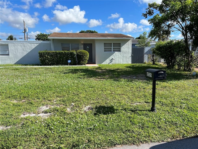 view of front of house with a front yard