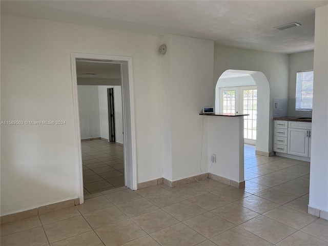 view of tiled spare room