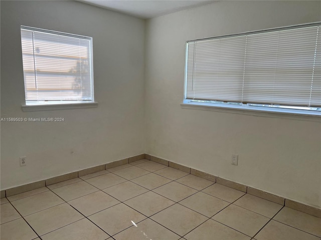 view of tiled spare room