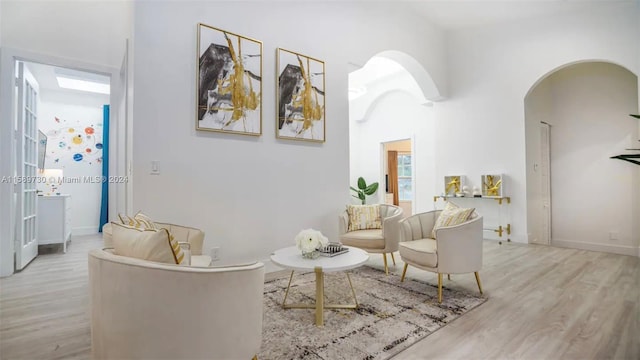 sitting room featuring light hardwood / wood-style floors