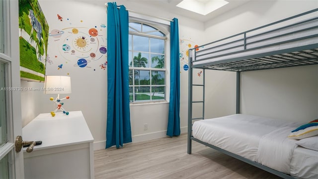 bedroom with light hardwood / wood-style floors