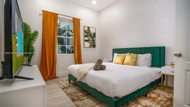 bedroom featuring light hardwood / wood-style floors