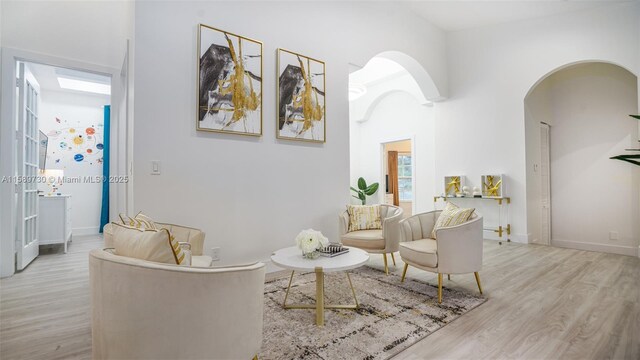 sitting room with light hardwood / wood-style floors