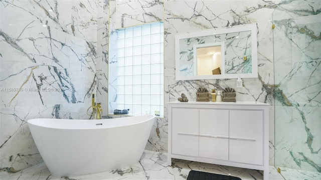 bathroom featuring vanity and a bathing tub