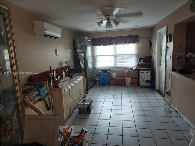 kitchen featuring a wall mounted air conditioner, ceiling fan, and light tile floors