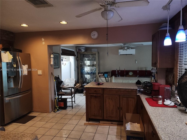 kitchen with black fridge with ice dispenser, an AC wall unit, pendant lighting, ceiling fan, and light tile floors