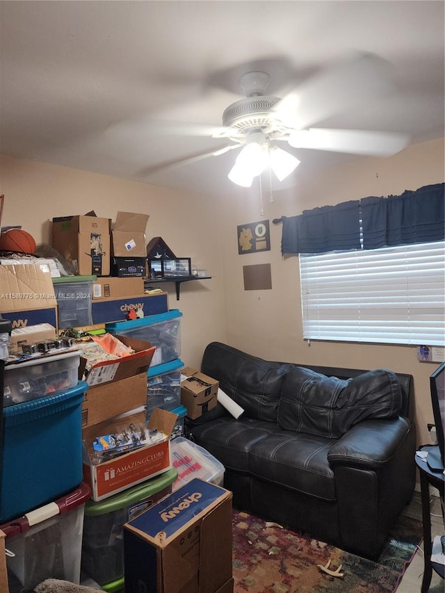 living room with ceiling fan