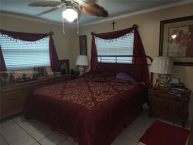 tiled bedroom featuring ceiling fan and crown molding