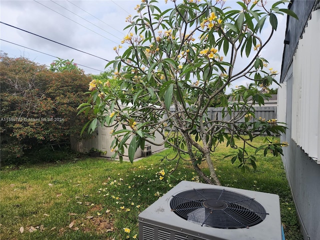 view of yard with central AC