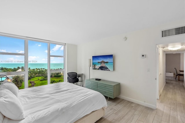 bedroom featuring light hardwood / wood-style flooring