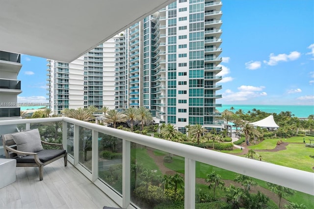 balcony featuring a water view