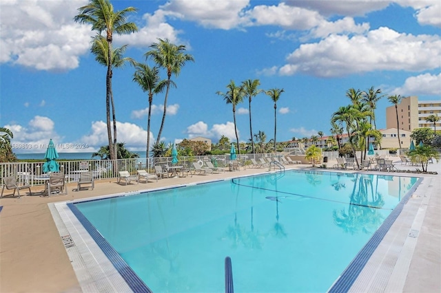 view of pool featuring a patio