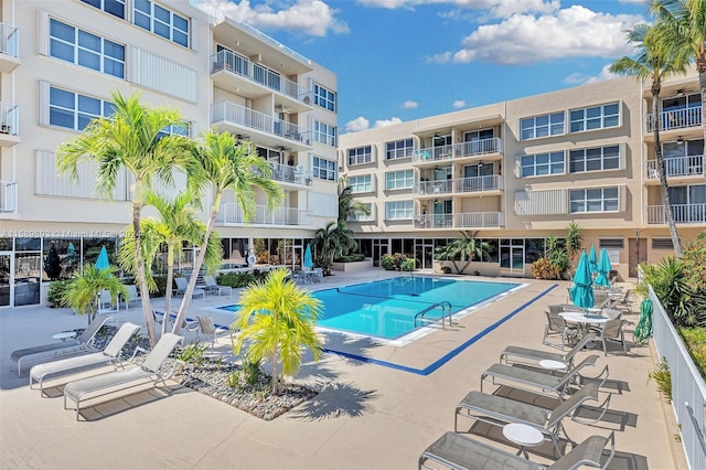 view of pool featuring a patio